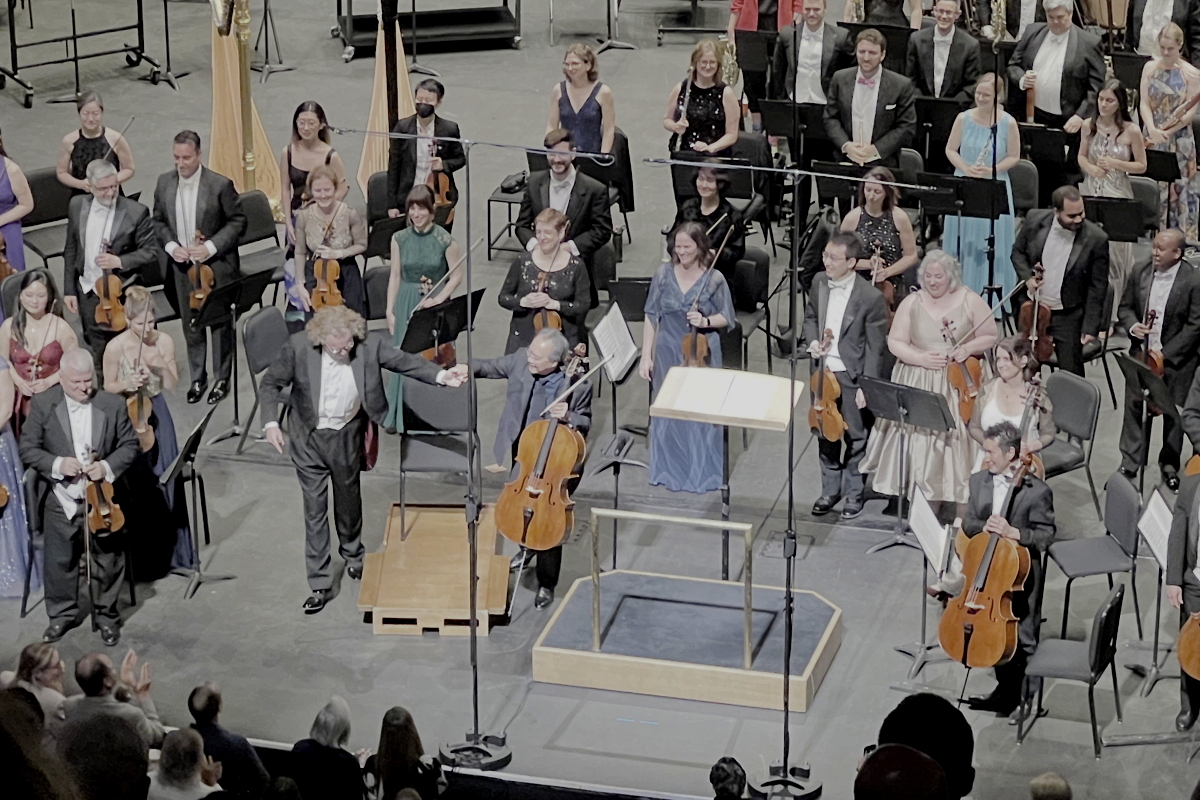 Yo-Yo Ma and Stéphane Denève take a curtain call after the Elgar concerto