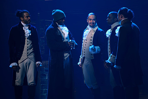 Lin-Manuel Miranda, Leslie Odom Jr., Okieriete Onaodowan, Daveed Diggs and Anthony Ramos perform on stage.