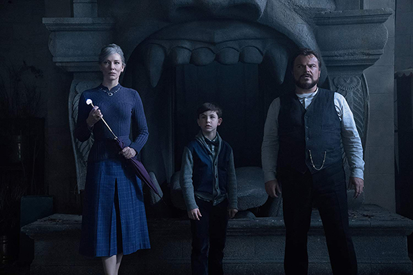 Cate Blanchett, Jack Black, and Owen Vaccaro in The House with a Clock in Its Walls 